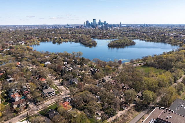 aerial overview of property's location featuring a large body of water and a skyline view