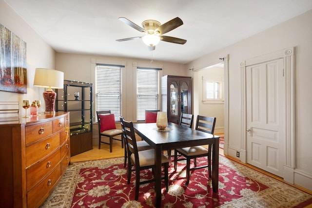 dining area with ceiling fan