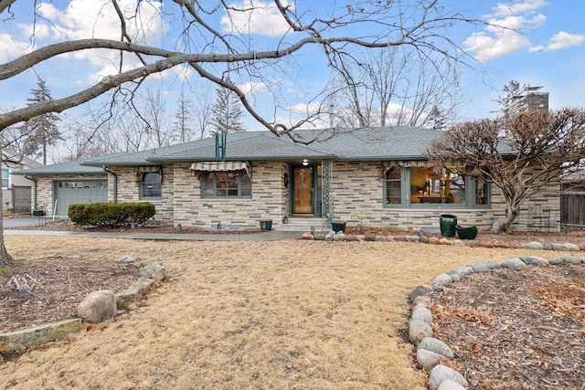 single story home featuring a garage, stone siding, a chimney, and roof with shingles