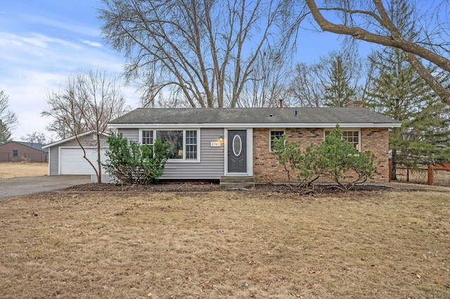 single story home featuring entry steps, brick siding, fence, and a chimney