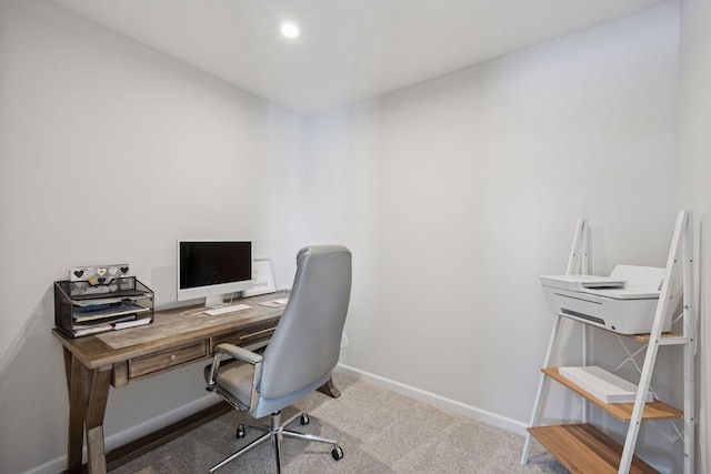 carpeted office space with recessed lighting and baseboards