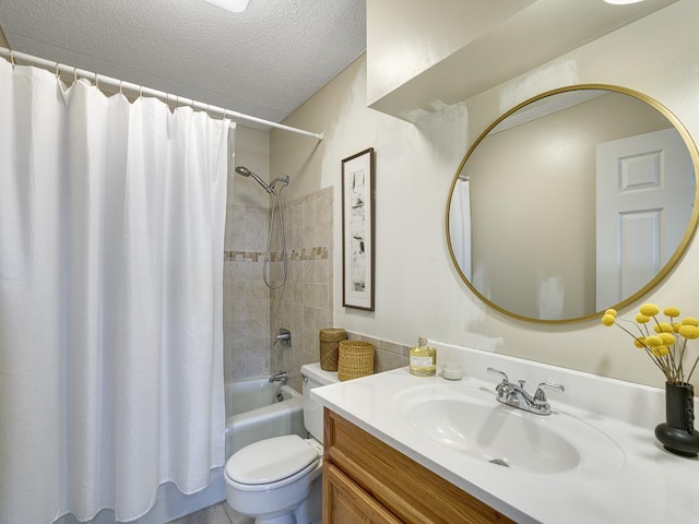 full bathroom with a textured ceiling, vanity, shower / bath combo with shower curtain, and toilet