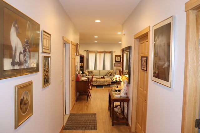 hallway featuring recessed lighting and light wood finished floors