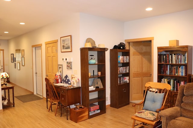 sitting room featuring recessed lighting and wood finished floors