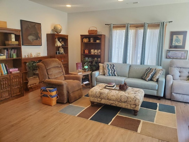 218 Thomas Dr, Rollingstone, MN 55969 - living room with wood finished floors and recessed lighting