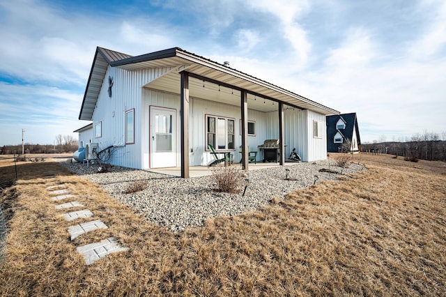 rear view of house featuring a patio area