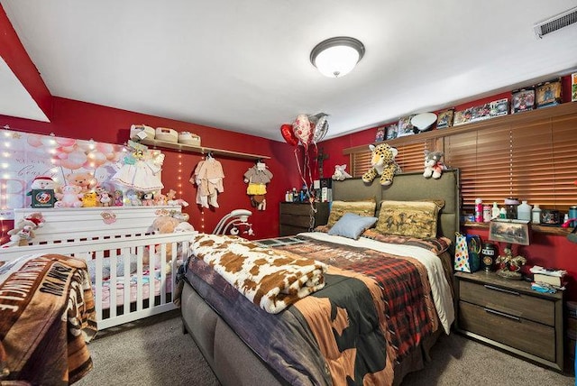 carpeted bedroom with visible vents