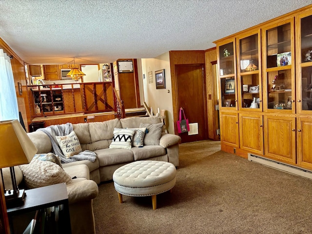 carpeted living room with stairs, visible vents, and a textured ceiling