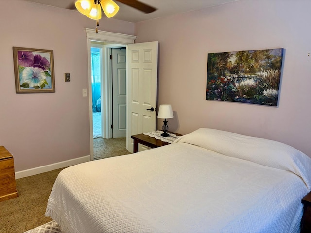 bedroom featuring a ceiling fan, carpet flooring, and baseboards