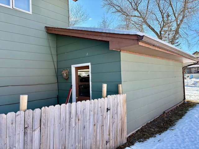 view of property exterior featuring fence