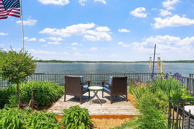 view of patio with a water view