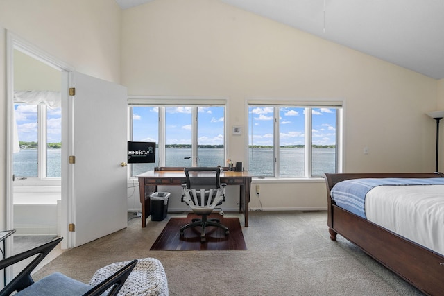 bedroom with carpet floors, a water view, high vaulted ceiling, and baseboards