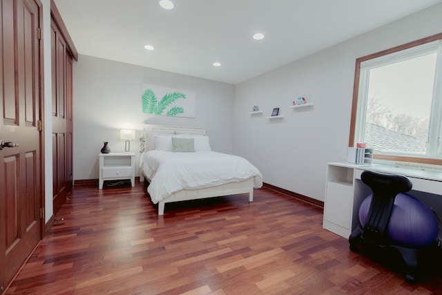 1301 12th Ave NW, New Brighton, MN 55112 - bedroom with wood finished floors, baseboards, and recessed lighting