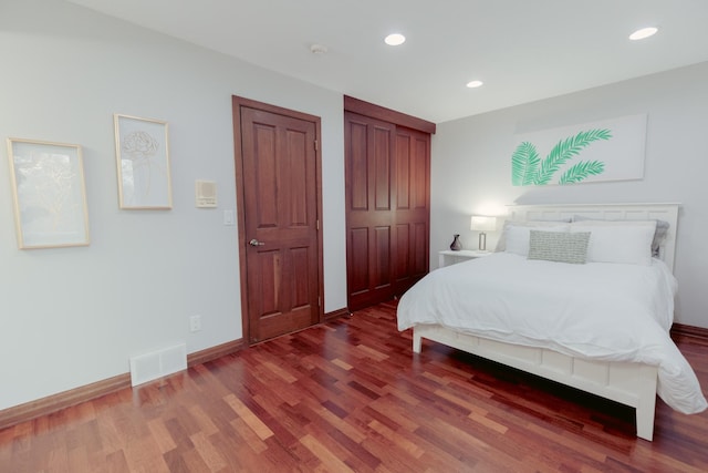 1301 12th Ave NW, New Brighton, MN 55112 - bedroom featuring wood finished floors, baseboards, and recessed lighting