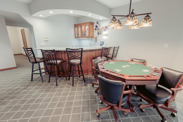 1301 12th Ave NW, New Brighton, MN 55112 - rec room with bar with sink, light colored carpet, recessed lighting, and baseboards