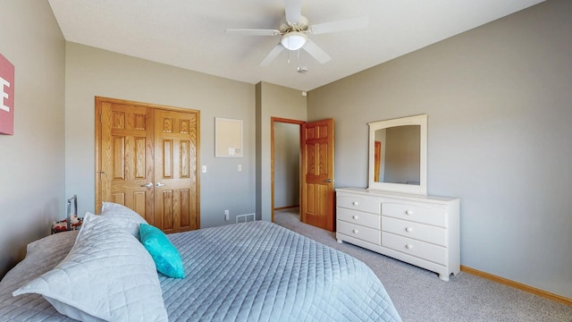 bedroom with visible vents, ceiling fan, baseboards, and carpet