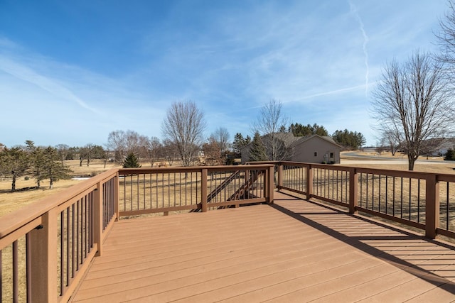 wooden terrace with a rural view