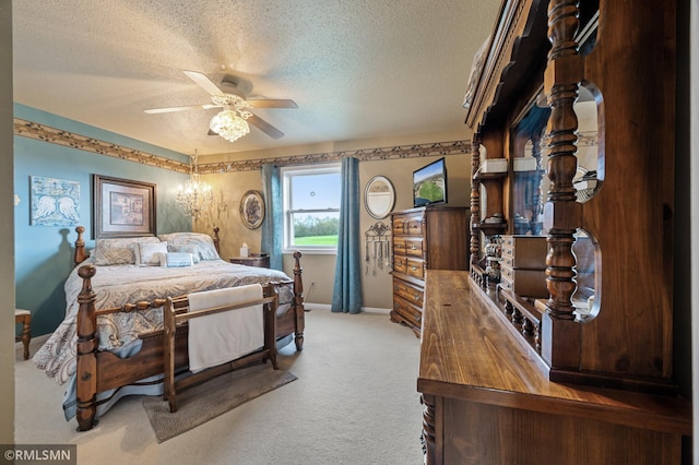 bedroom with ceiling fan, a textured ceiling, baseboards, and carpet flooring