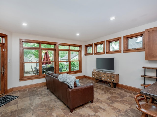1286 Fairmount Ave, Saint Paul, MN 55105 - living room with baseboards, stone finish flooring, and recessed lighting