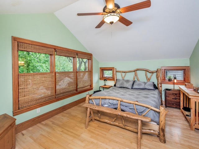 1286 Fairmount Ave, Saint Paul, MN 55105 - bedroom featuring vaulted ceiling, wood finished floors, baseboards, and a ceiling fan