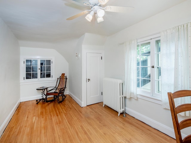 1286 Fairmount Ave, Saint Paul, MN 55105 - sitting room featuring radiator, light wood-style flooring, baseboards, and a ceiling fan