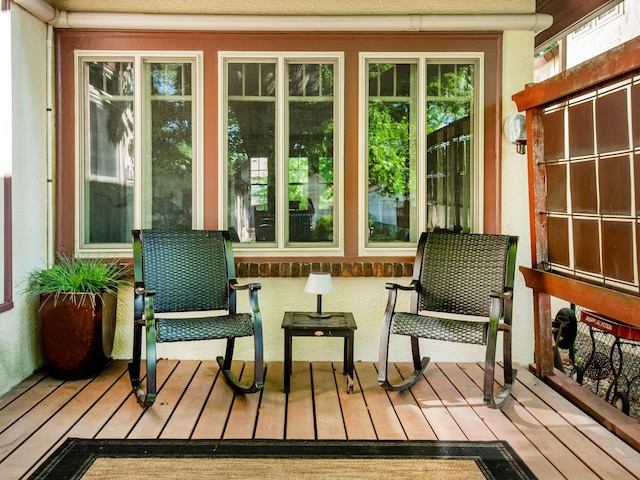 1286 Fairmount Ave, Saint Paul, MN 55105 - sunroom with hardwood / wood-style floors and a deck