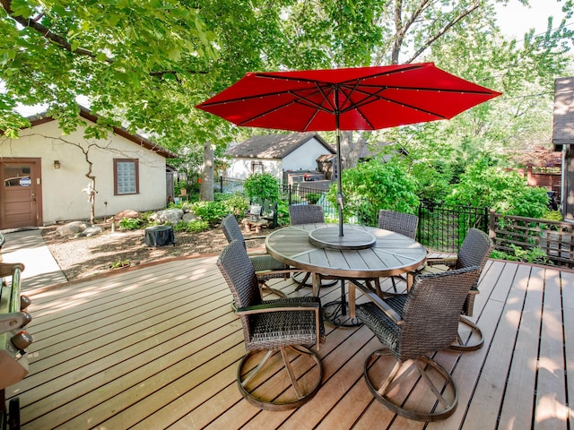 1286 Fairmount Ave, Saint Paul, MN 55105 - wooden deck with outdoor dining area