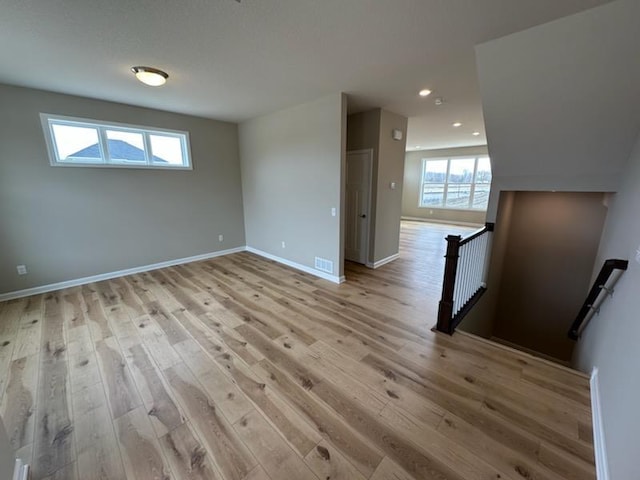 14403 107th Pl N, Maple Grove, MN 55369 - unfurnished room featuring baseboards, recessed lighting, visible vents, and light wood-style floors