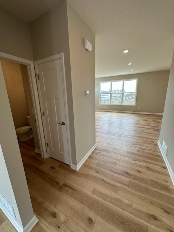 14403 107th Pl N, Maple Grove, MN 55369 - hallway with light wood-style floors, recessed lighting, and baseboards