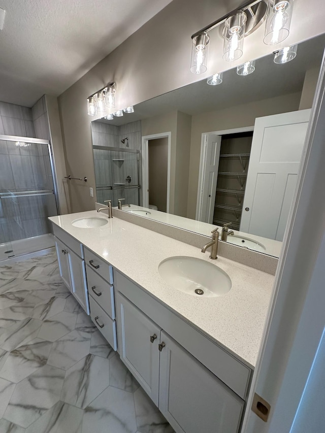 14403 107th Pl N, Maple Grove, MN 55369 - full bath with a stall shower, marble finish floor, and a sink