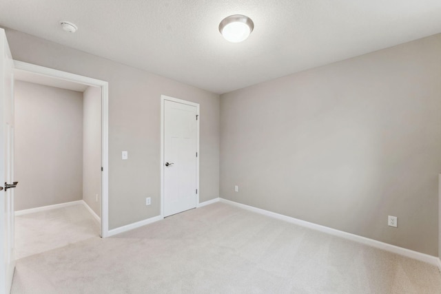 14403 107th Pl N, Maple Grove, MN 55369 - unfurnished bedroom featuring light colored carpet and baseboards