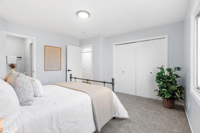 carpeted bedroom with a closet