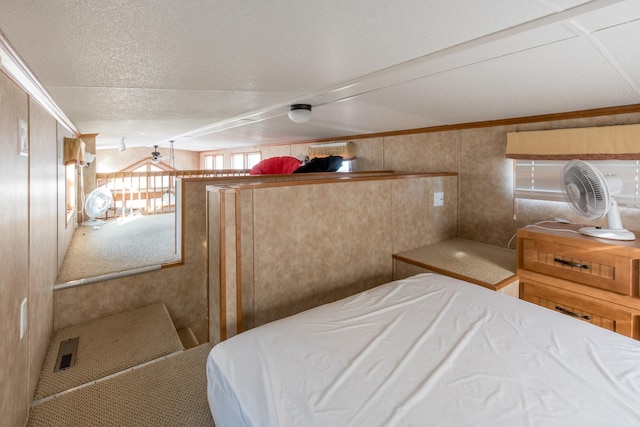 bedroom featuring visible vents and a textured ceiling