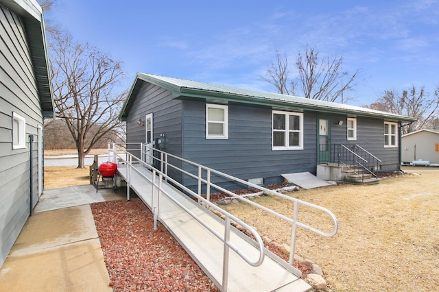 view of front of property with metal roof