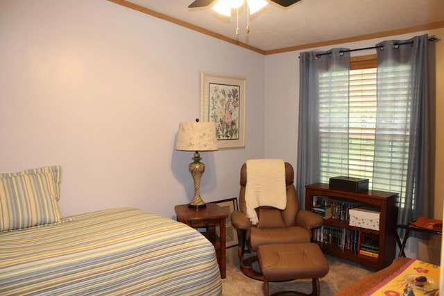 bedroom featuring ceiling fan and crown molding