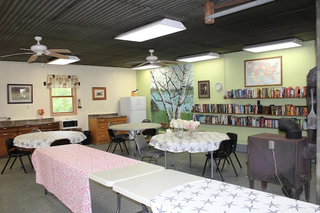 dining area with ceiling fan