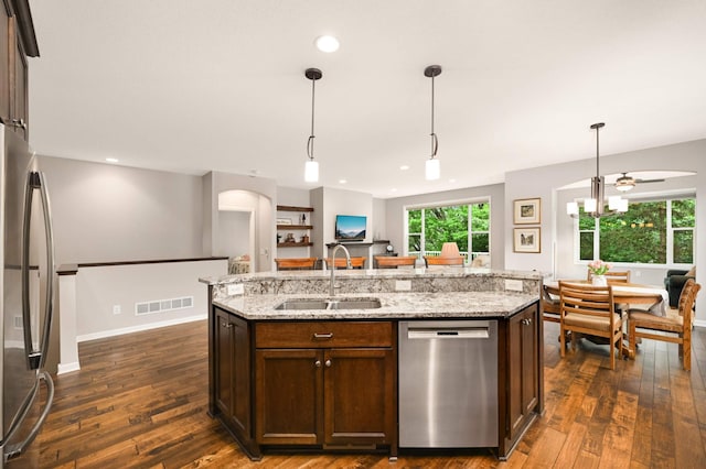 3595 Lemieux Cir, Eagan, MN 55122 - kitchen featuring stainless steel appliances, a sink, dark wood-style flooring, pendant lighting, and recessed lighting