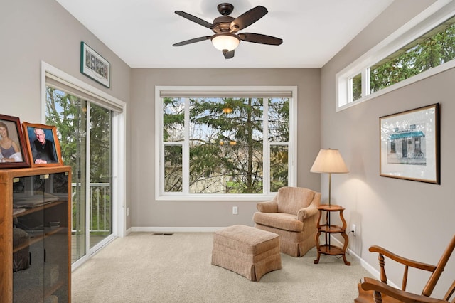 3595 Lemieux Cir, Eagan, MN 55122 - sitting room with baseboards, carpet flooring, and ceiling fan