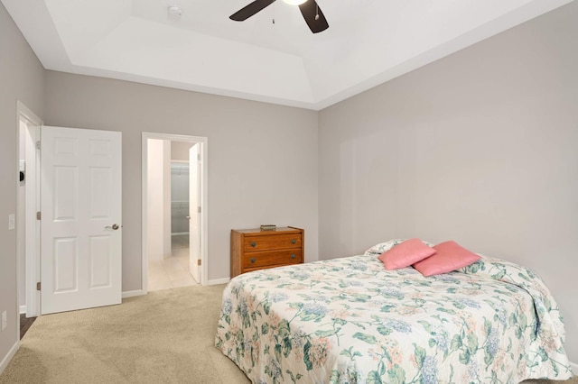 3595 Lemieux Cir, Eagan, MN 55122 - bedroom with a tray ceiling, carpet flooring, baseboards, and a ceiling fan