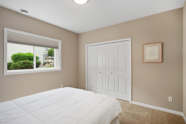 3595 Lemieux Cir, Eagan, MN 55122 - carpeted bedroom with baseboards and a closet