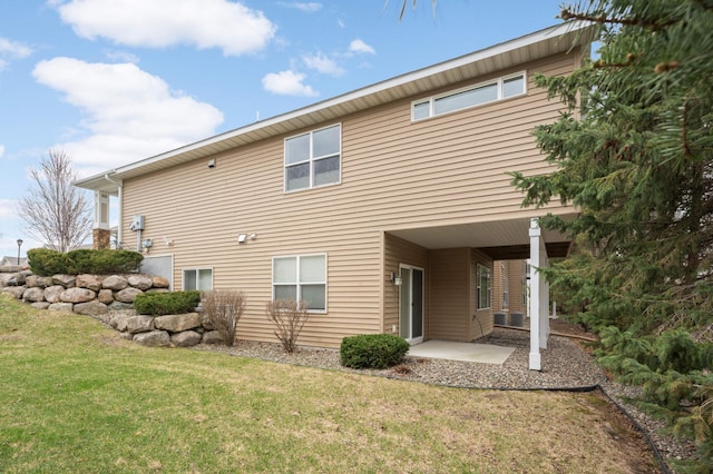 3595 Lemieux Cir, Eagan, MN 55122 - rear view of house with a yard and central AC unit