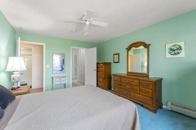 carpeted bedroom with ceiling fan, a baseboard heating unit, and a textured ceiling