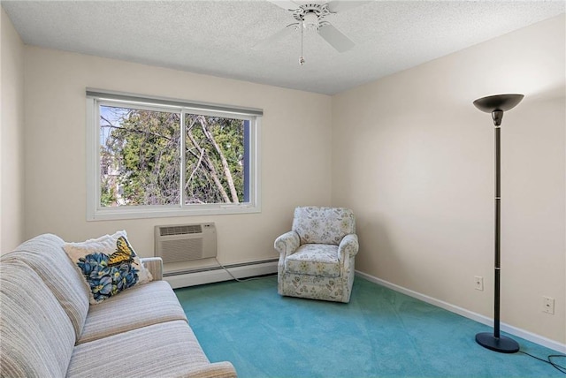 interior space featuring a baseboard radiator, a wall unit AC, and a textured ceiling