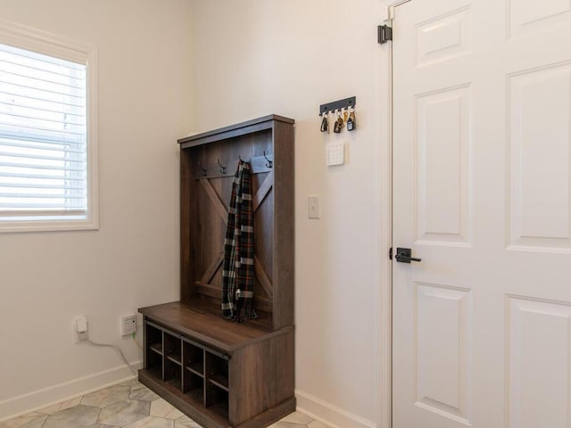 mudroom featuring baseboards