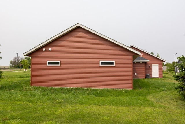 619 6th St, West Concord, MN 55985 - view of property exterior featuring central air condition unit