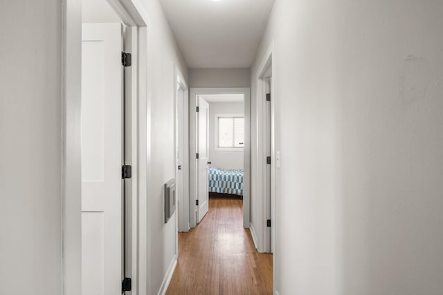 corridor featuring light wood-style flooring