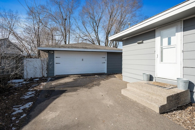 detached garage with fence