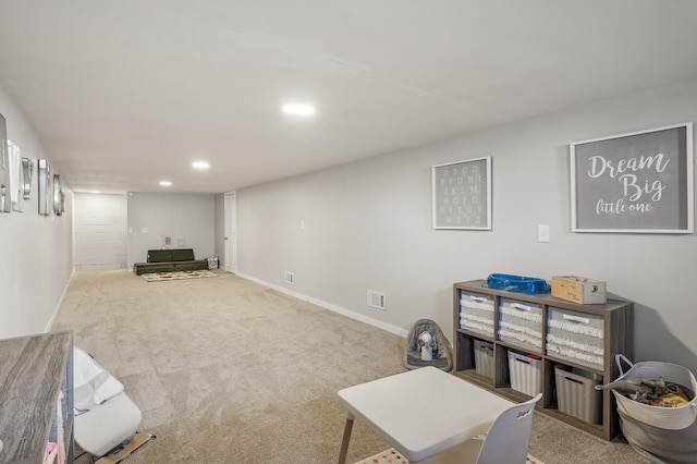 interior space featuring carpet flooring, recessed lighting, visible vents, and baseboards