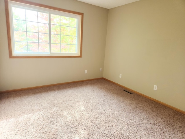 7721 Elm Grove Ave, New Hope, MN 55428 - carpeted empty room featuring baseboards
