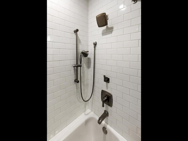 interior space featuring bathing tub / shower combination